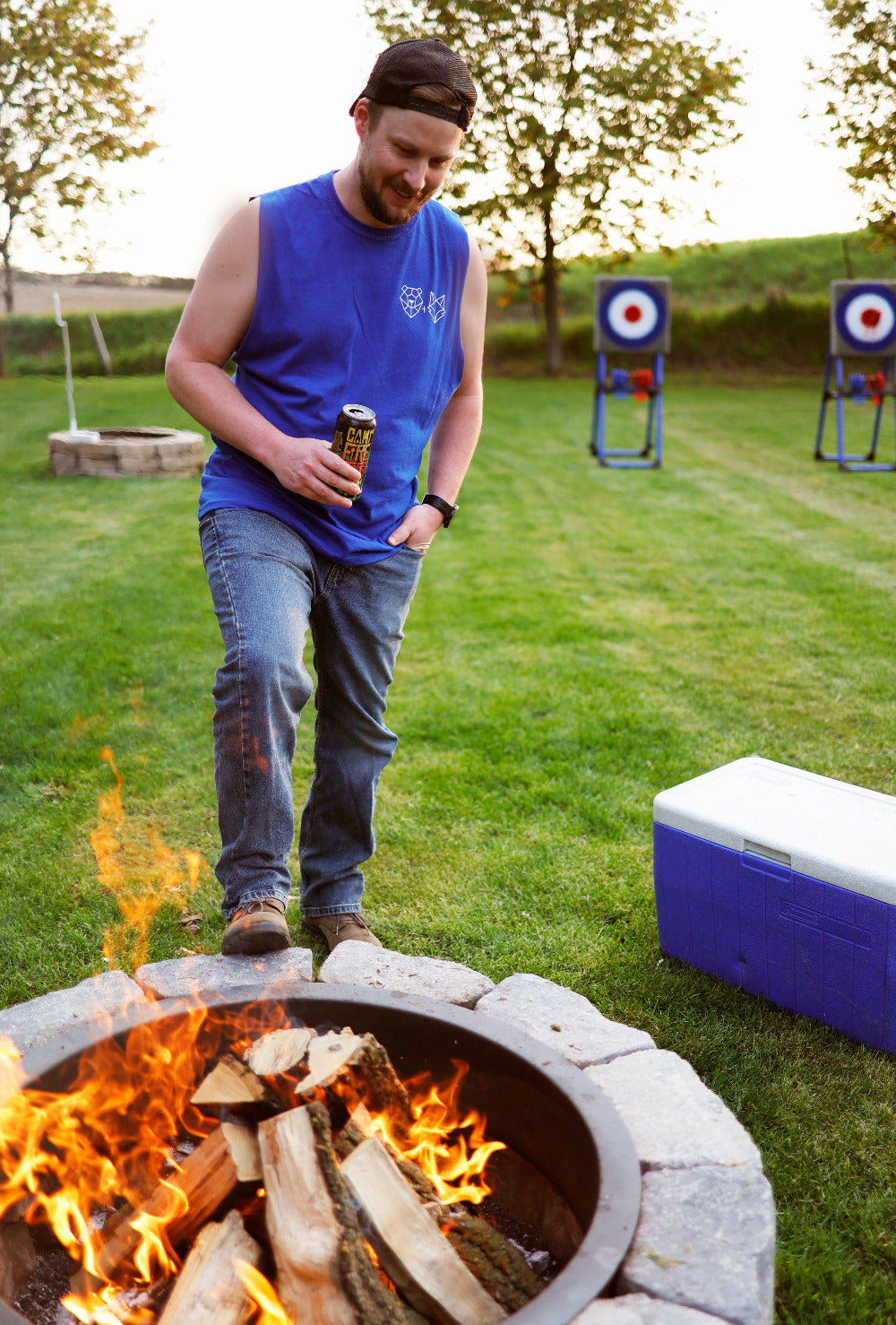 summer blues tank on man at willow lake campground drinking upper thames brewery beer collab with bear and fox apparel