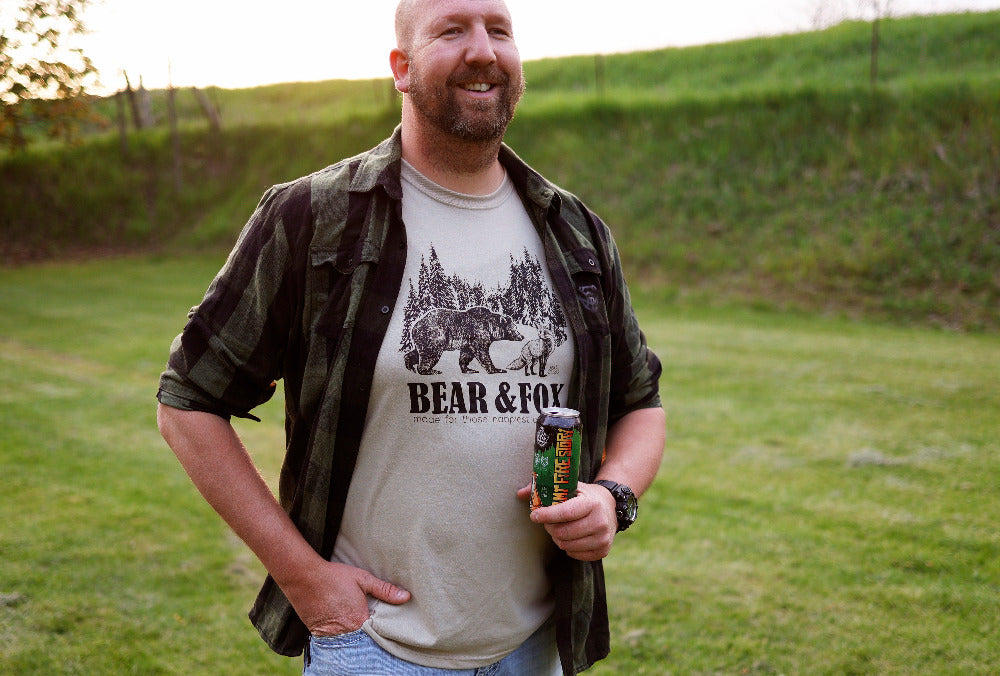 vintage reflections tee on man paired with kawartha dinner jacket and upper thames brewing company collab with bear and fox apparel
